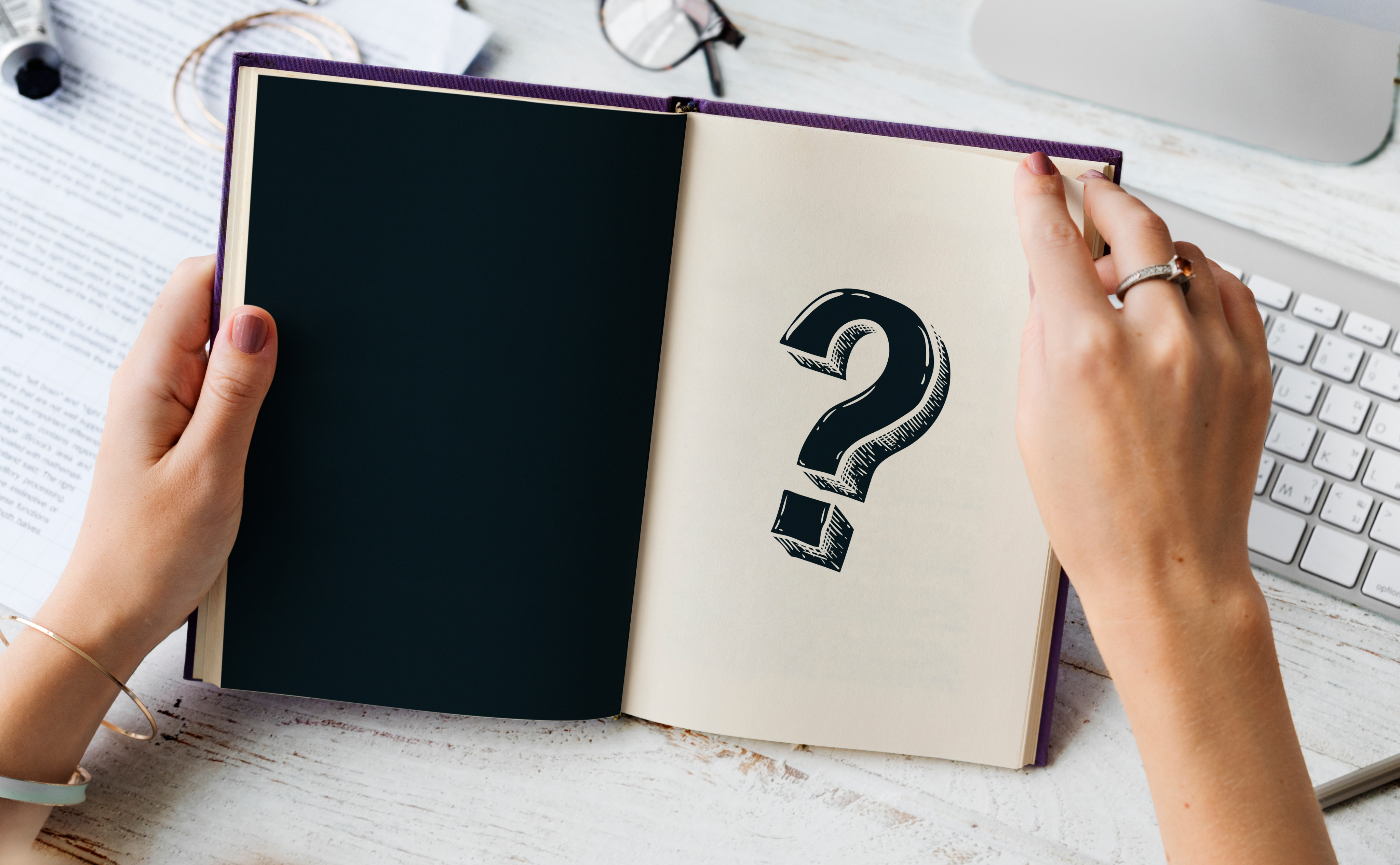 Question mark in a notebook